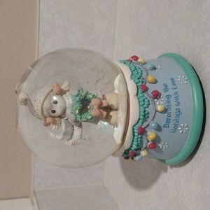 Precious Moments snow globe.